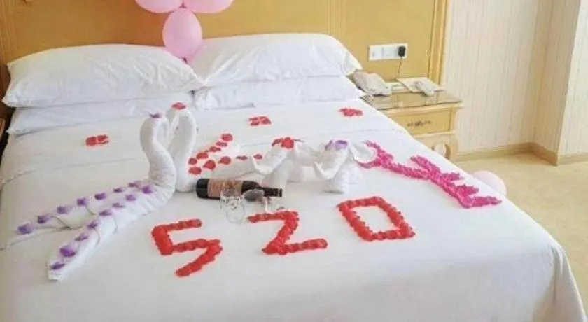 Bed in Vienna Hotel Guangxi Yulin Rong County Guinan Road