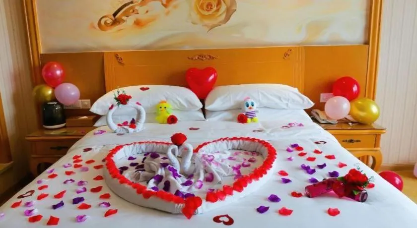 Bed in Vienna Hotel Guangxi Yulin Rong County Guinan Road