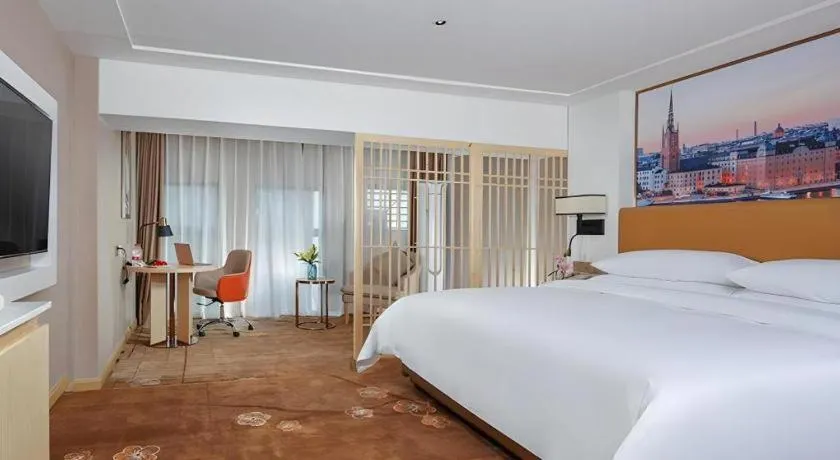 Bed in Vienna Hotel Chengdu Exhibition Center In Time City