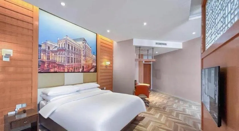Bed in Vienna Hotel Chengdu Exhibition Center In Time City