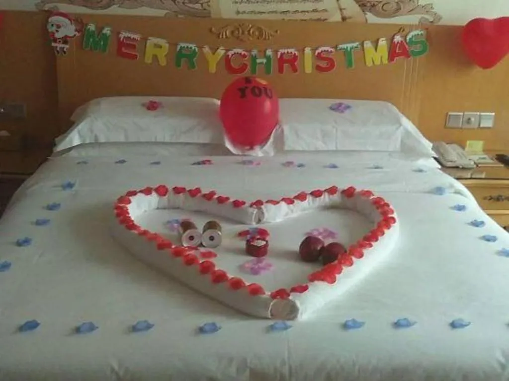 Bed in Vienna Hotel Guangxi Fangcheng