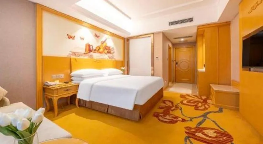 Bed in Vienna Hotel Guangxi Fangcheng