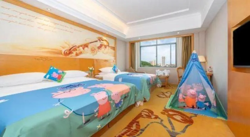 Bed in Vienna Hotel Guangxi Fangcheng