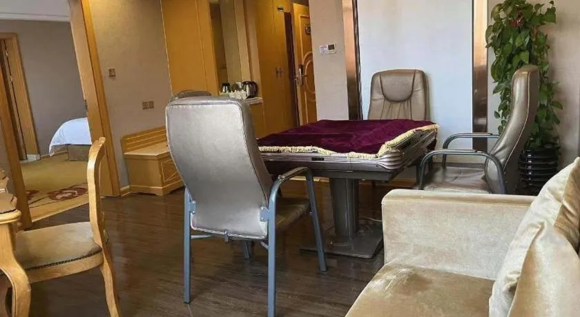 Bed in Vienna Hotel Guangxi Fangcheng