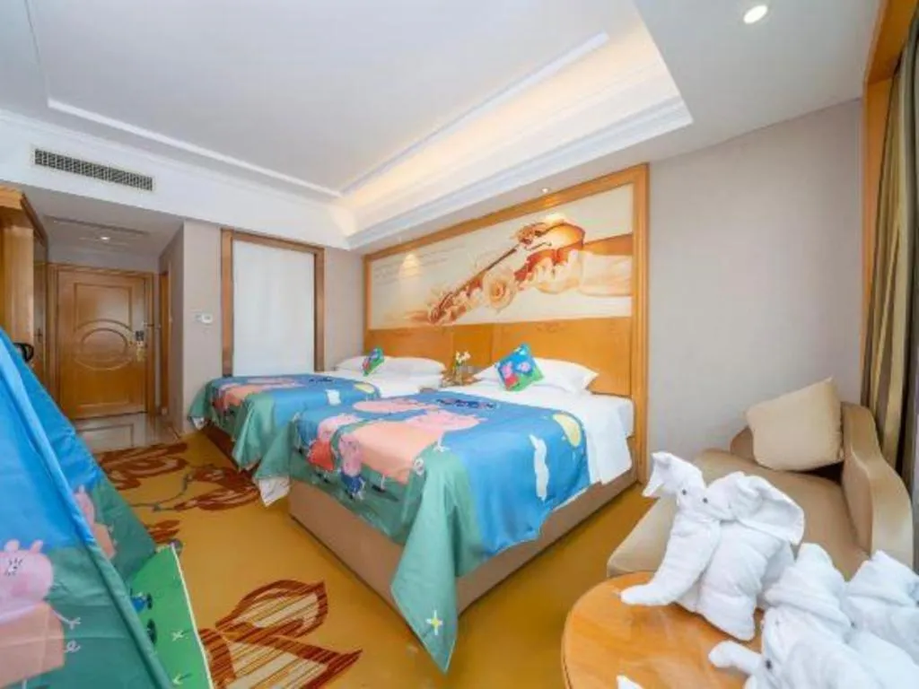 Bed in Vienna Hotel Guangxi Fangcheng