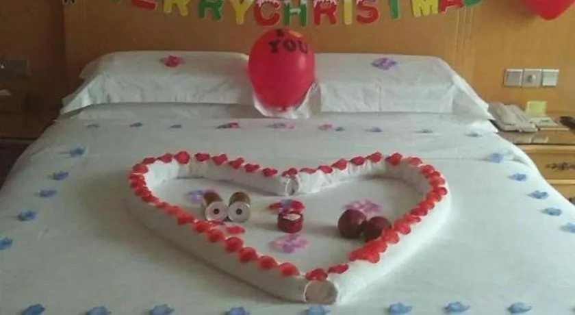 Bed in Vienna Hotel Guangxi Fangcheng