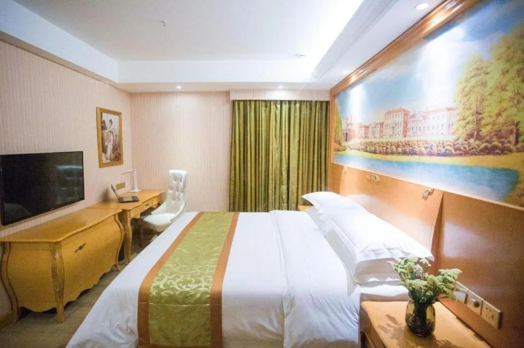 Bed in Vienna Hotel Shandong Laizhou Langhu International Plaza