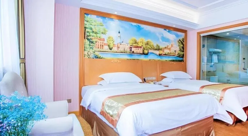 Bed in Vienna Hotel Shandong Laizhou Langhu International Plaza