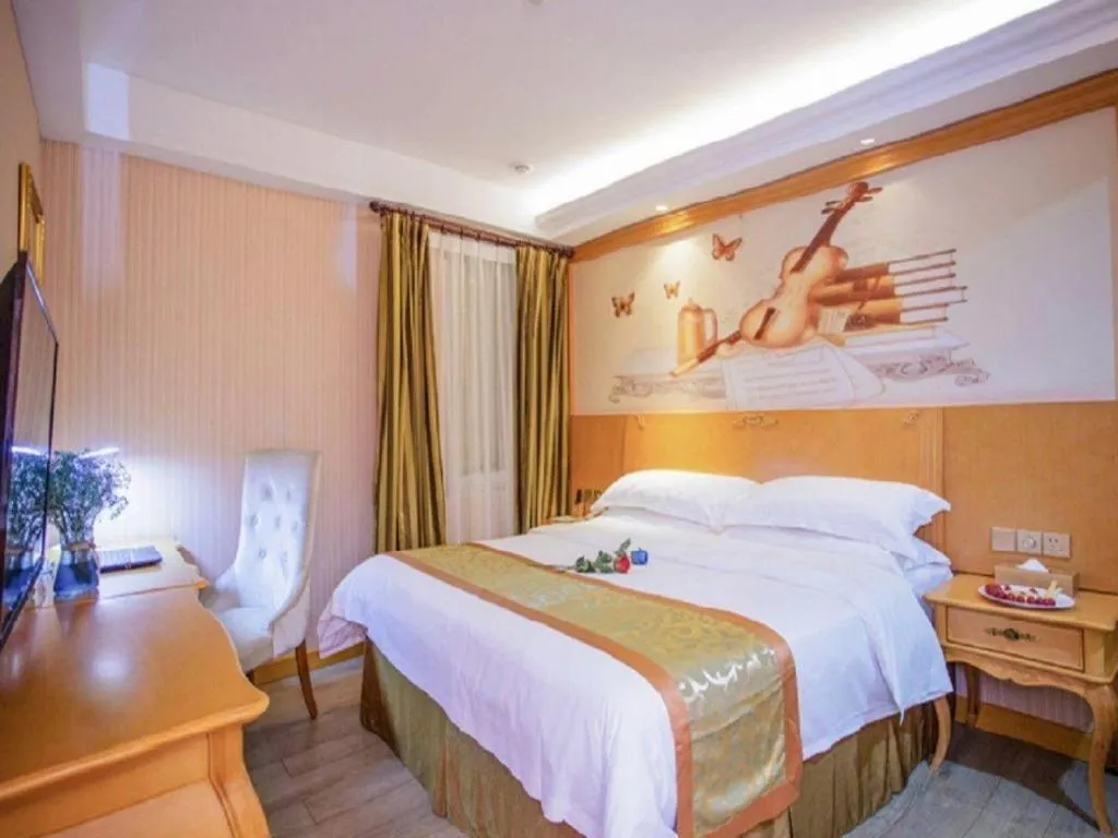 Bed in Vienna Hotel Shandong Laizhou Langhu International Plaza