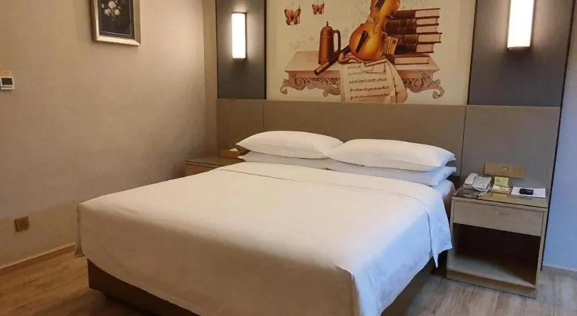 Bed in Vienna Hotel Guangdong Shaoguan Shaonan Avenue