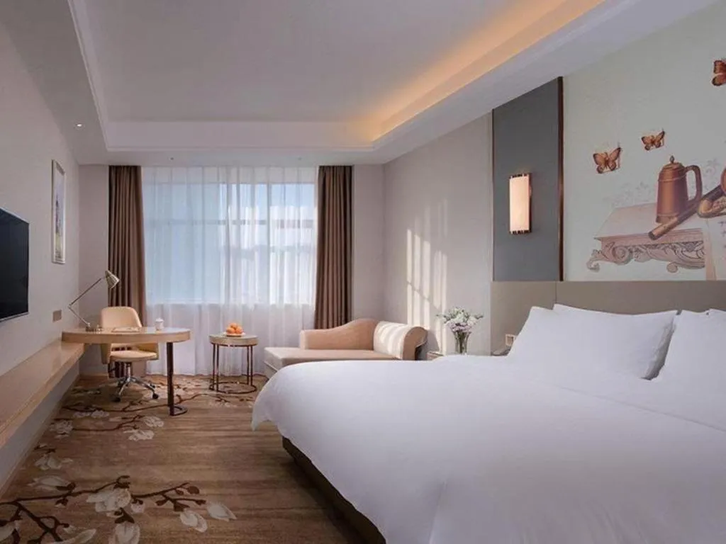 Bed in Vienna Hotel Guangdong Shaoguan Shaonan Avenue