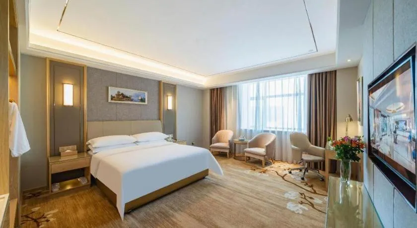 Bed in Vienna Hotel Guangdong Shaoguan Shaonan Avenue