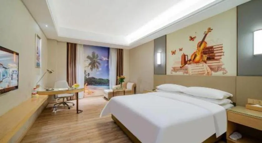 Bed in Vienna Hotel Guangdong Shaoguan Shaonan Avenue