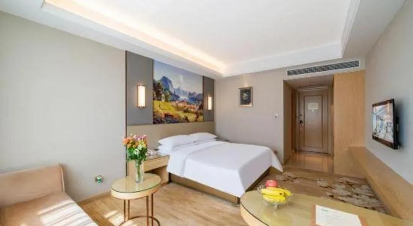 Bed in Vienna Hotel Guangdong Shaoguan Shaonan Avenue