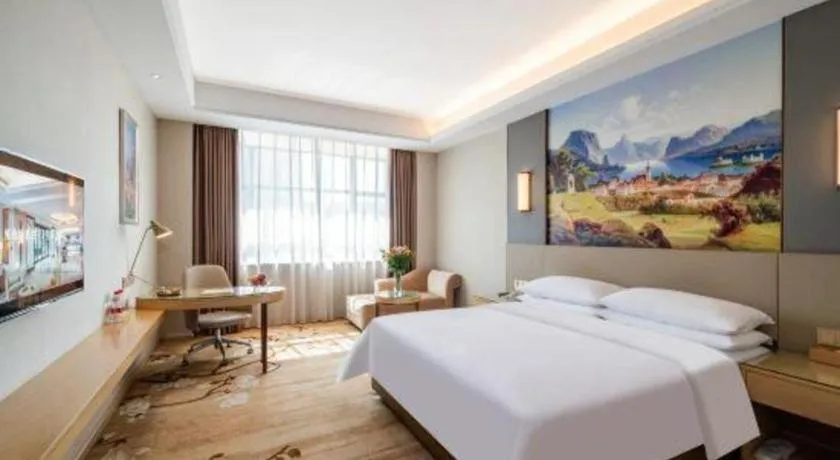 Bed in Vienna Hotel Guangdong Shaoguan Shaonan Avenue