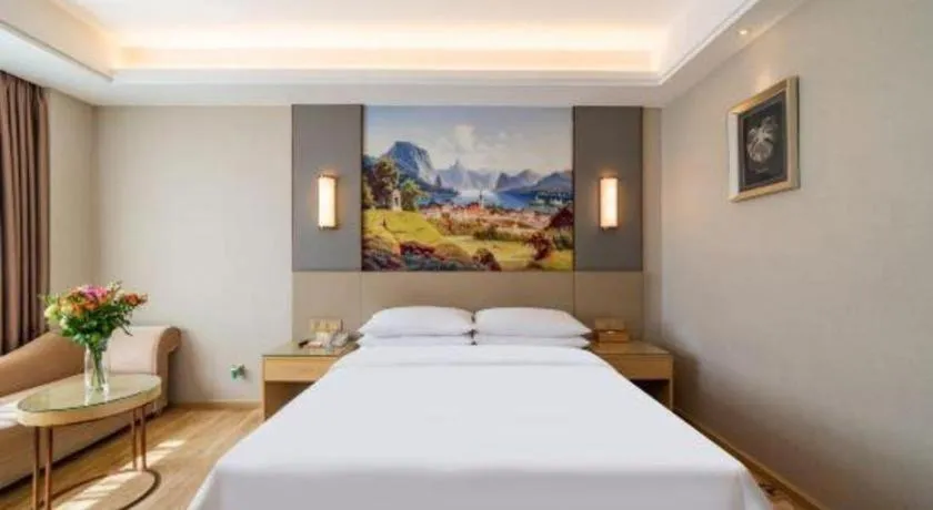 Bed in Vienna Hotel Guangdong Shaoguan Shaonan Avenue