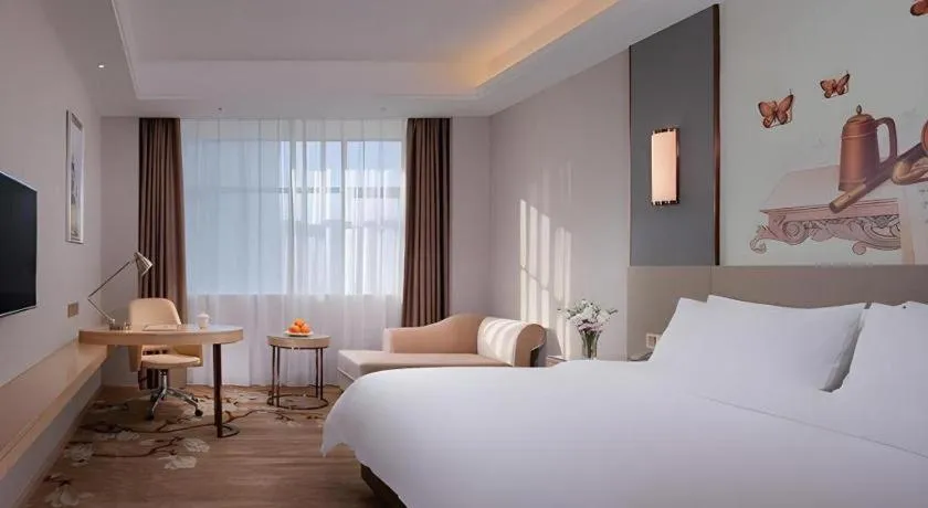Bed in Vienna Hotel Guangdong Shaoguan Shaonan Avenue