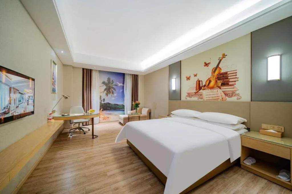 Bed in Vienna Hotel Guangdong Shaoguan Shaonan Avenue