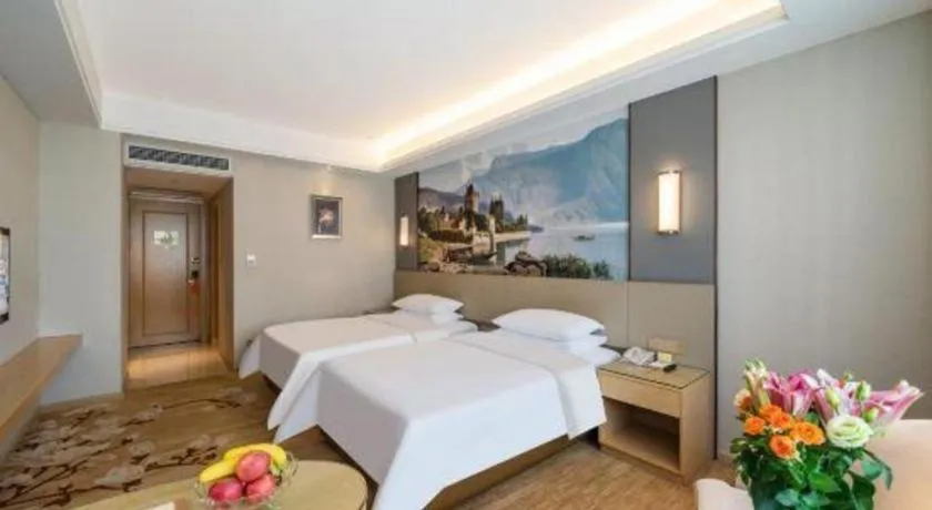 Bed in Vienna Hotel Guangdong Shaoguan Shaonan Avenue