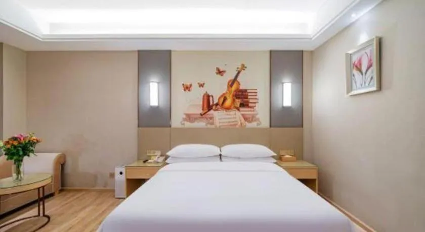 Bed in Vienna Hotel Guangdong Shaoguan Shaonan Avenue