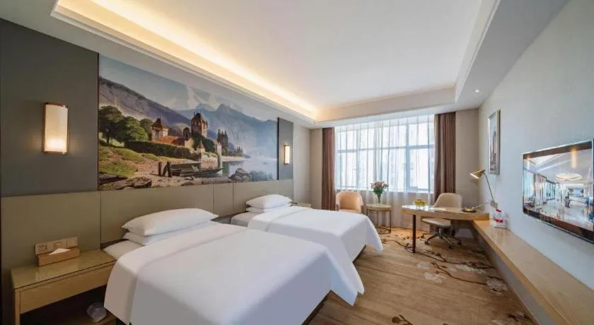 Bed in Vienna Hotel Guangdong Shaoguan Shaonan Avenue