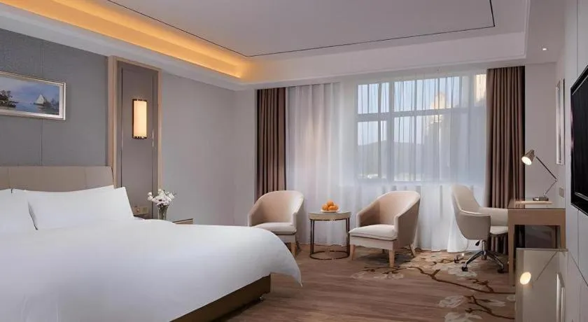 Bed in Vienna Hotel Guangdong Shaoguan Shaonan Avenue