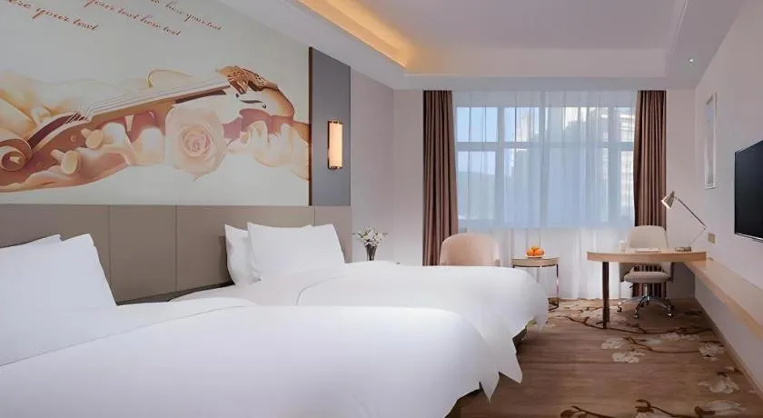 Bed in Vienna Hotel Guangdong Shaoguan Shaonan Avenue