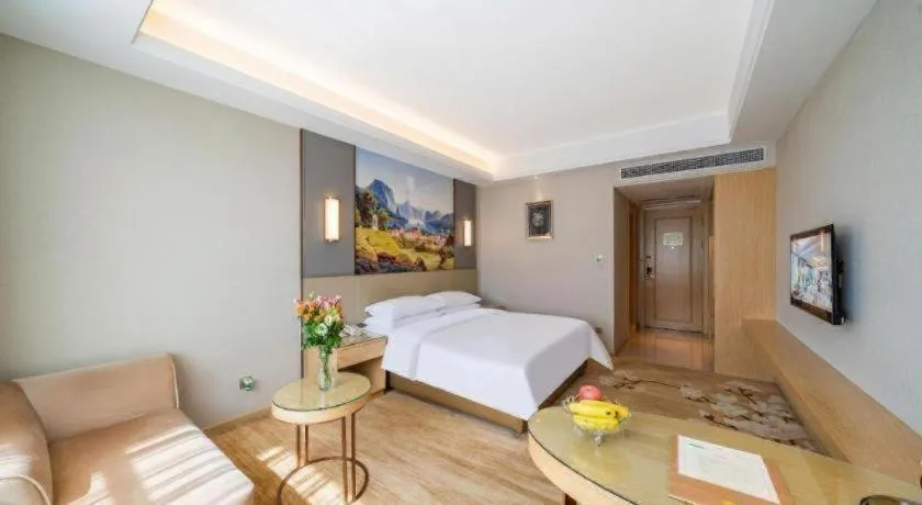 Bed in Vienna Hotel Guangdong Shaoguan Shaonan Avenue