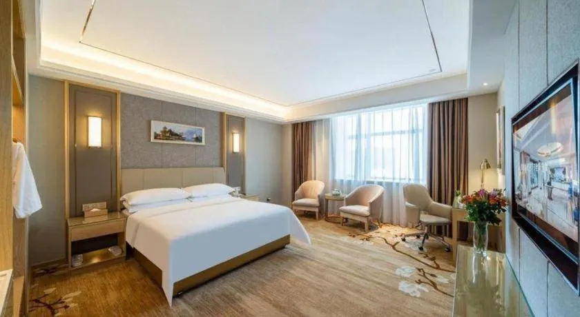 Bed in Vienna Hotel Guangdong Shaoguan Shaonan Avenue