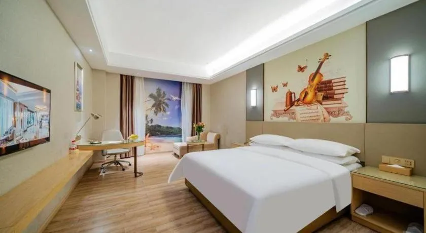 Bed in Vienna Hotel Guangdong Shaoguan Shaonan Avenue