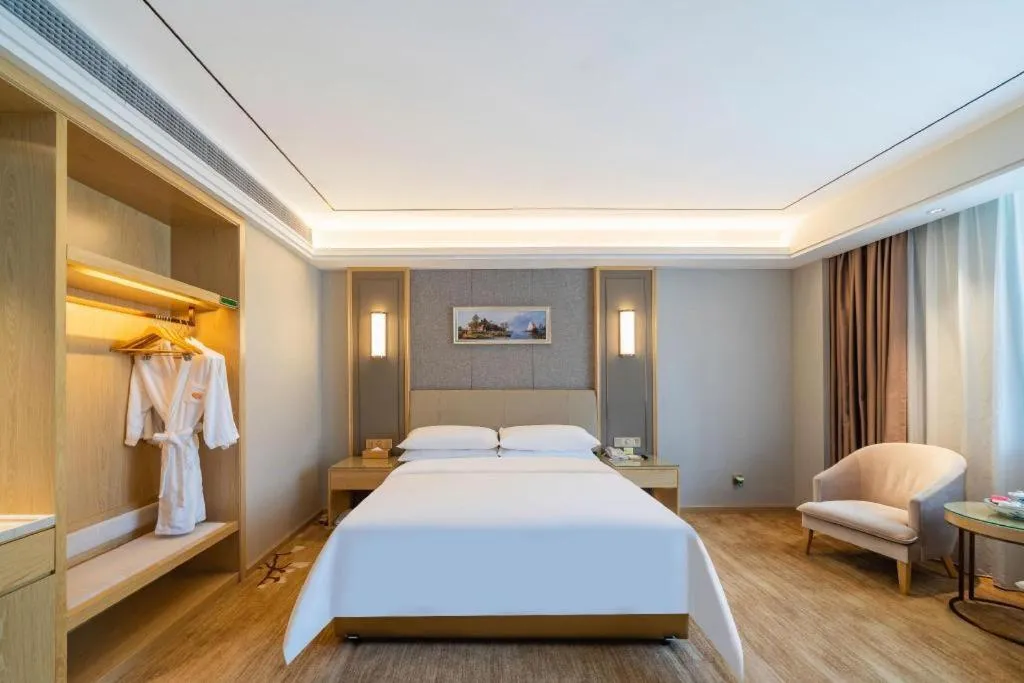 Bed in Vienna Hotel Guangdong Shaoguan Shaonan Avenue