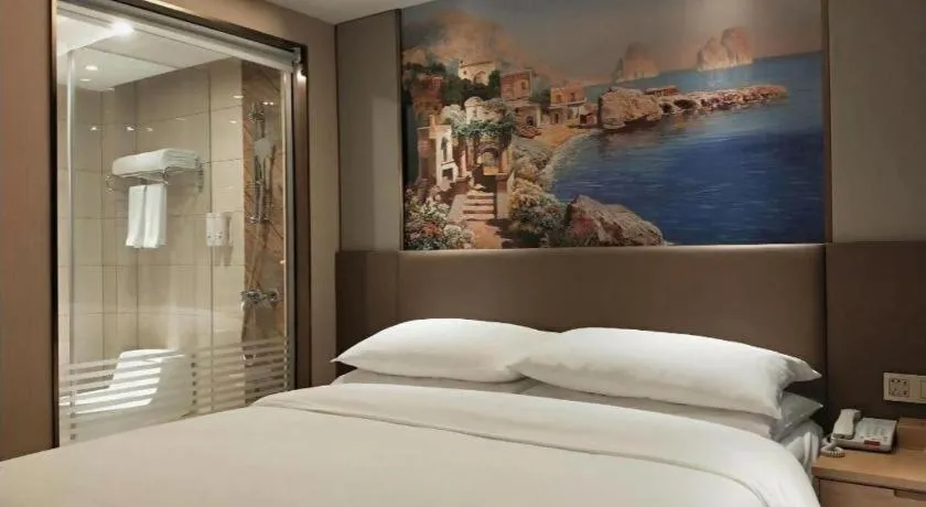 Bed in Vienna Hotel Shandong Qingdao Taidong Pijiu Street Liaoning Road