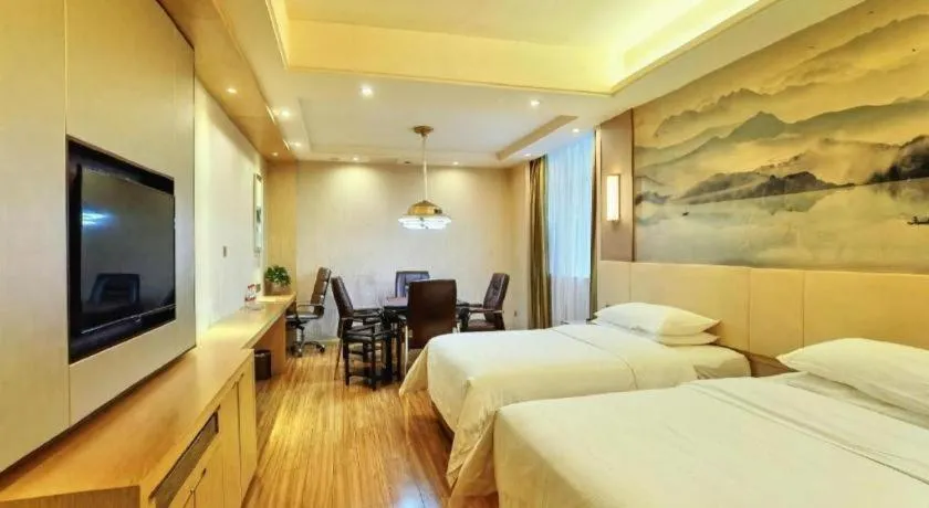 Bed in Vienna Hotel Hunan Huaihua Xupu Wanda Plaza