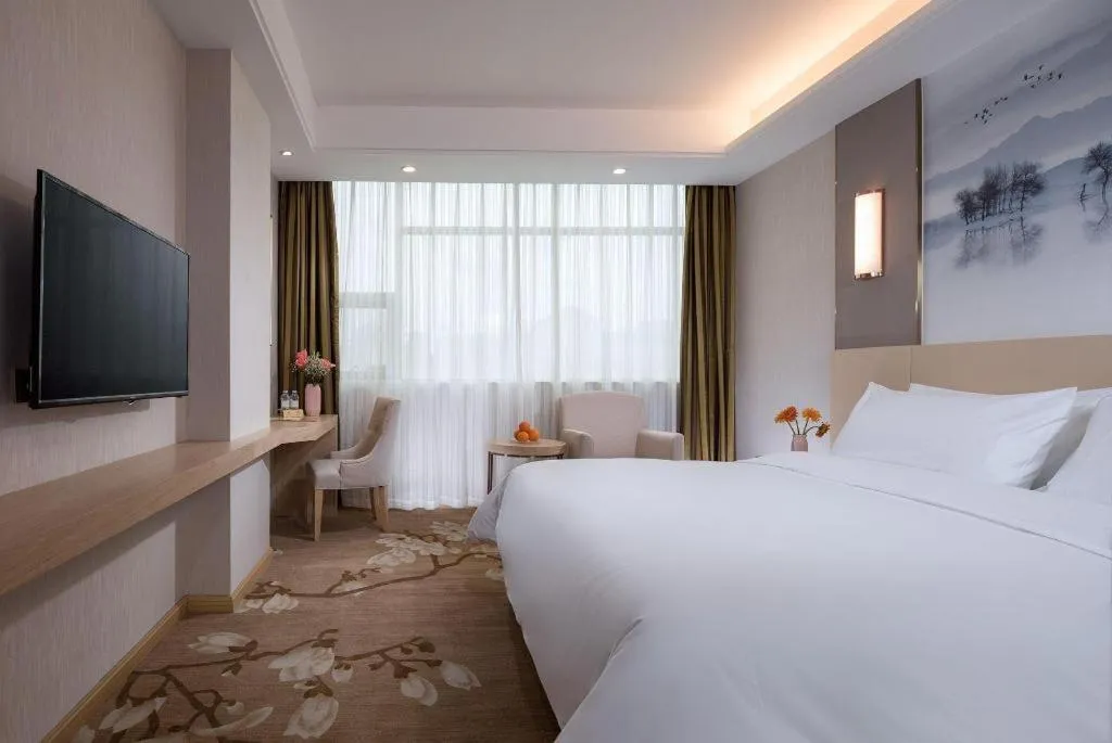 Bed in Vienna Hotel Hunan Huaihua Xupu Wanda Plaza
