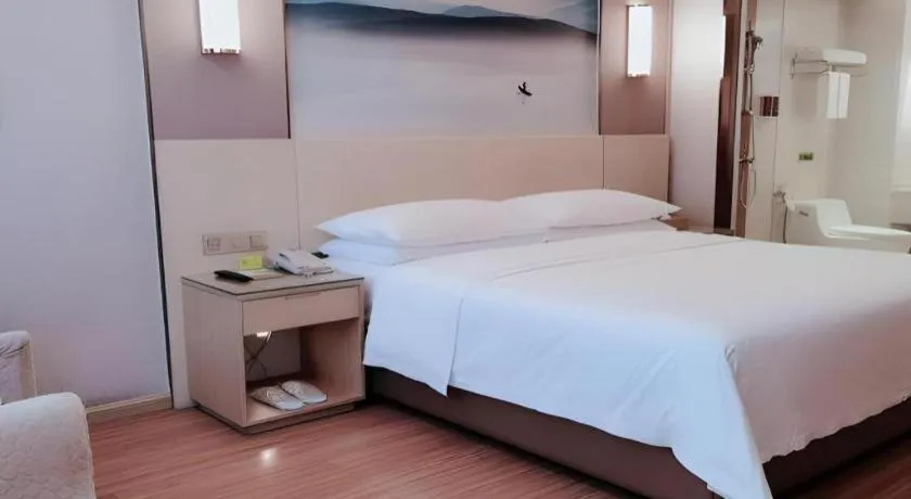 Bed in Vienna Hotel Hunan Huaihua Xupu Wanda Plaza