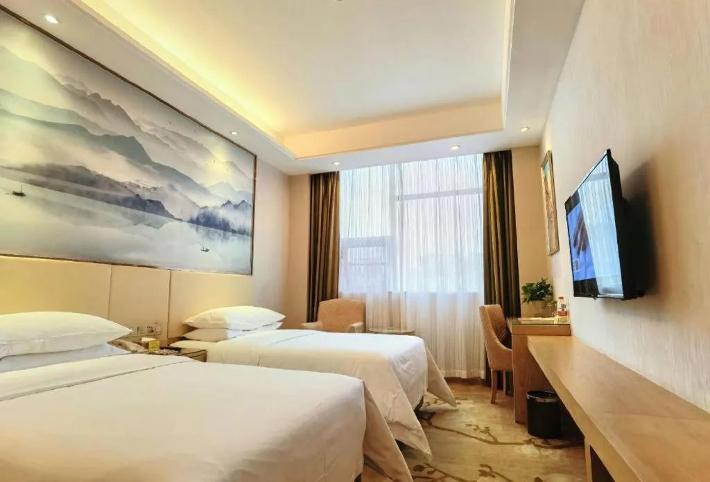 Bed in Vienna Hotel Hunan Huaihua Xupu Wanda Plaza