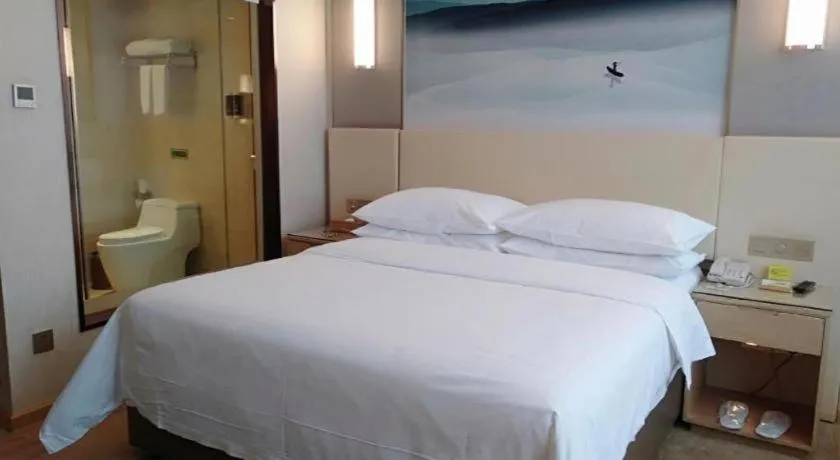 Bed in Vienna Hotel Hunan Huaihua Xupu Wanda Plaza