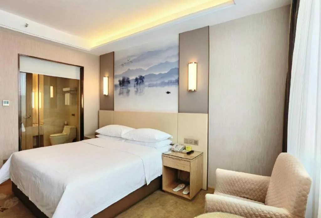 Bed in Vienna Hotel Hunan Huaihua Xupu Wanda Plaza
