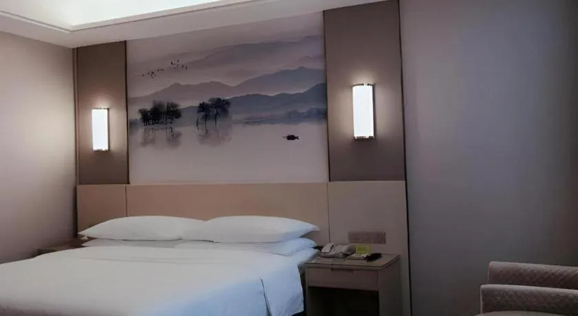 Bed in Vienna Hotel Hunan Huaihua Xupu Wanda Plaza
