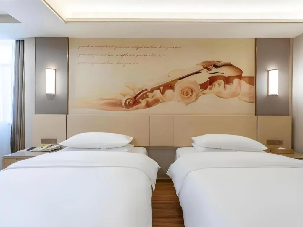 Bed in Vienna Hotel Hunan Huaihua Xupu Wanda Plaza