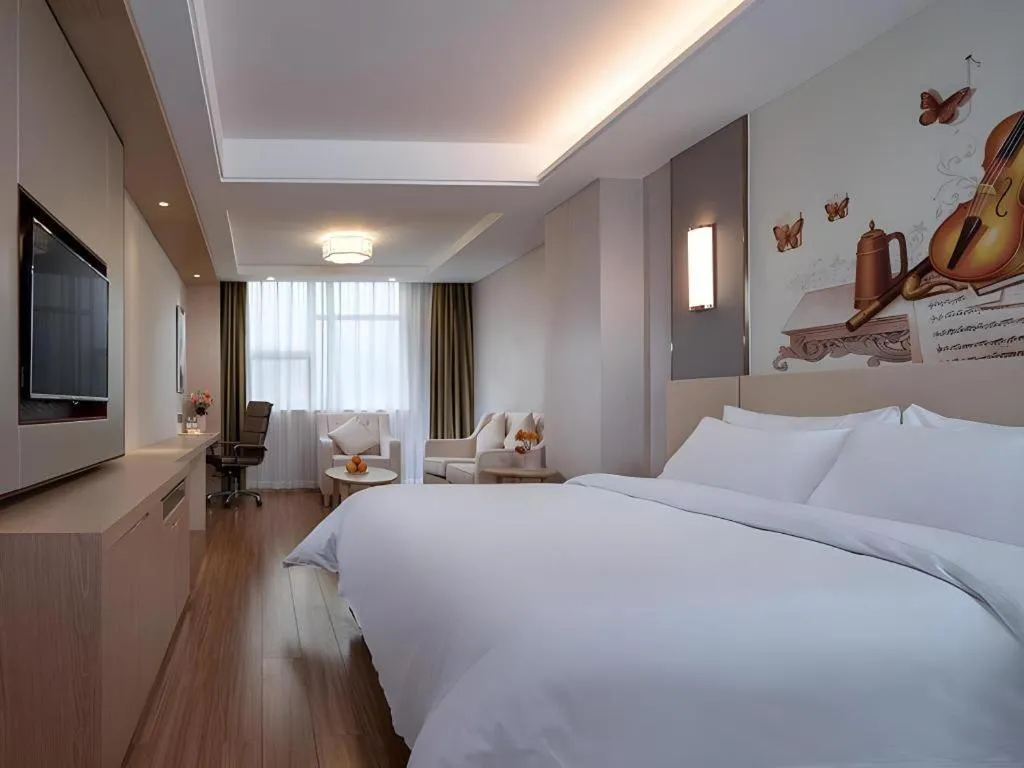 Bed in Vienna Hotel Hunan Huaihua Xupu Wanda Plaza
