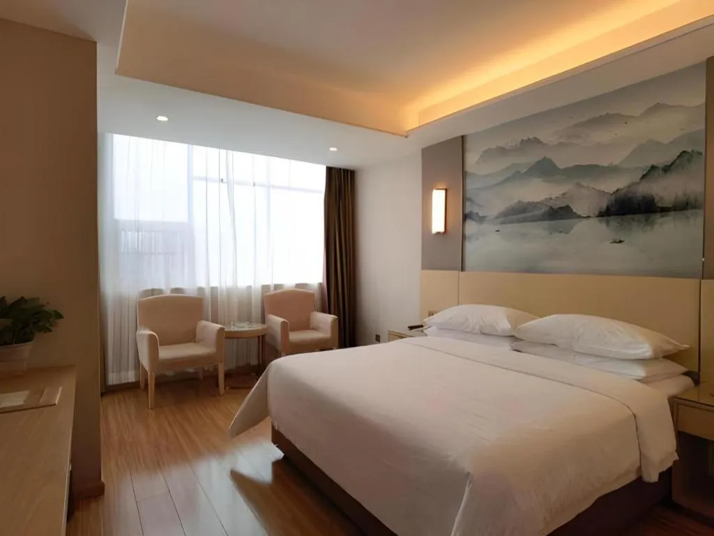 Bed in Vienna Hotel Hunan Huaihua Xupu Wanda Plaza