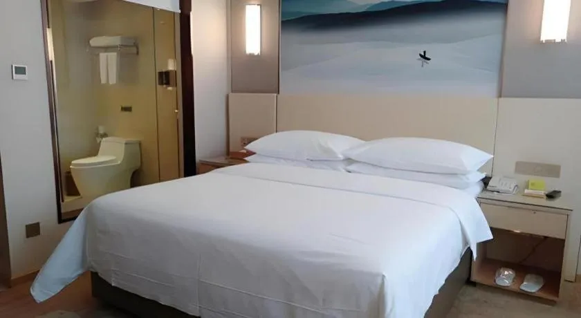 Bed in Vienna Hotel Hunan Huaihua Xupu Wanda Plaza