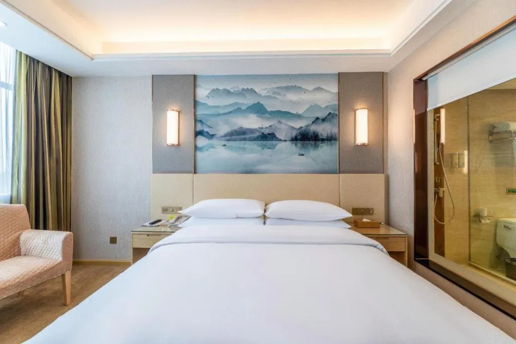 Bed in Vienna Hotel Hunan Huaihua Xupu Wanda Plaza
