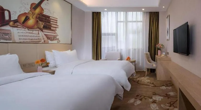 Bed in Vienna Hotel Hunan Huaihua Xupu Wanda Plaza