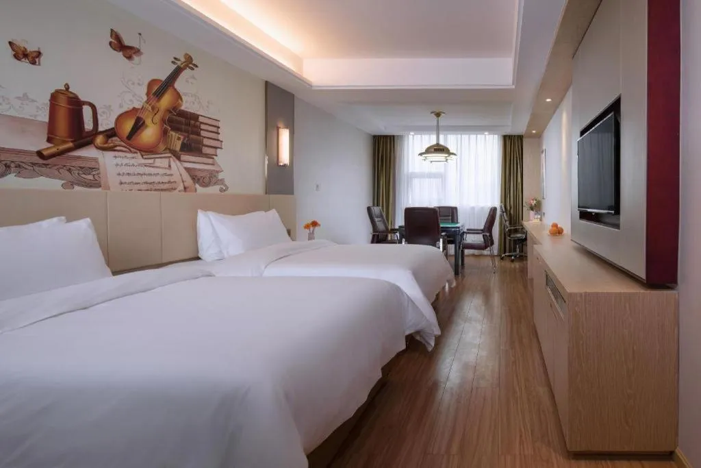 Bed in Vienna Hotel Hunan Huaihua Xupu Wanda Plaza