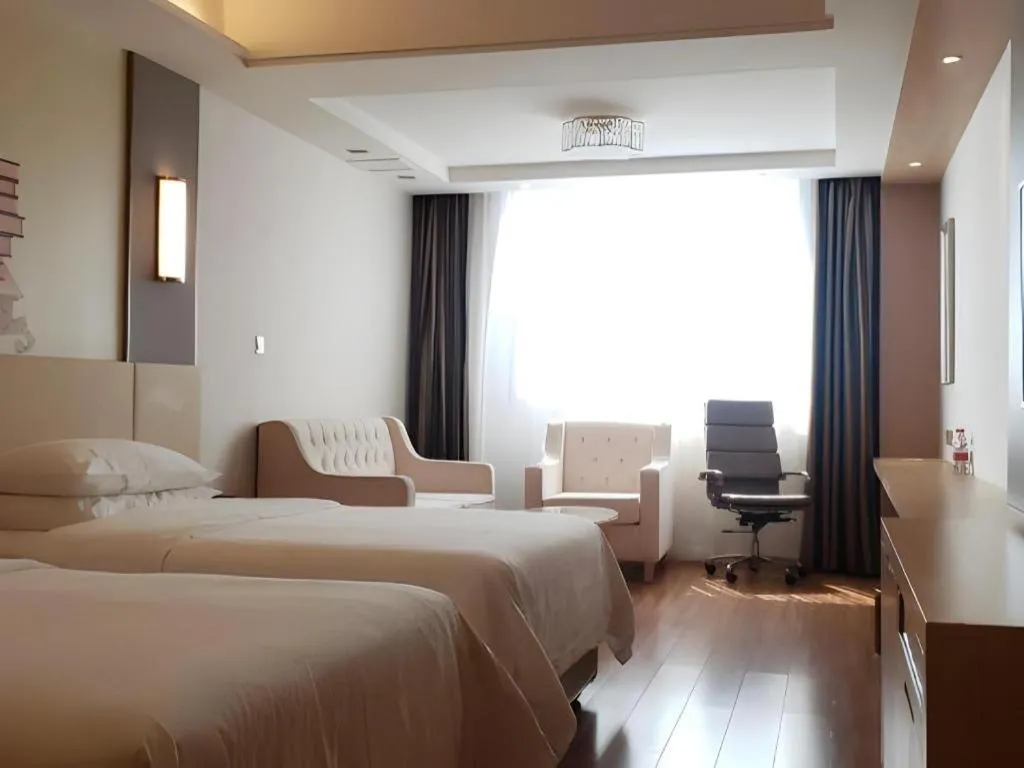 Bed in Vienna Hotel Hunan Huaihua Xupu Wanda Plaza