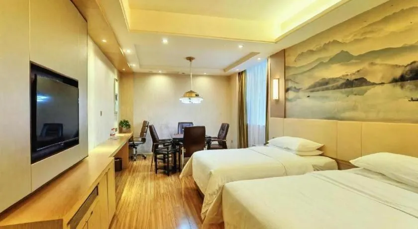 Bed in Vienna Hotel Hunan Huaihua Xupu Wanda Plaza