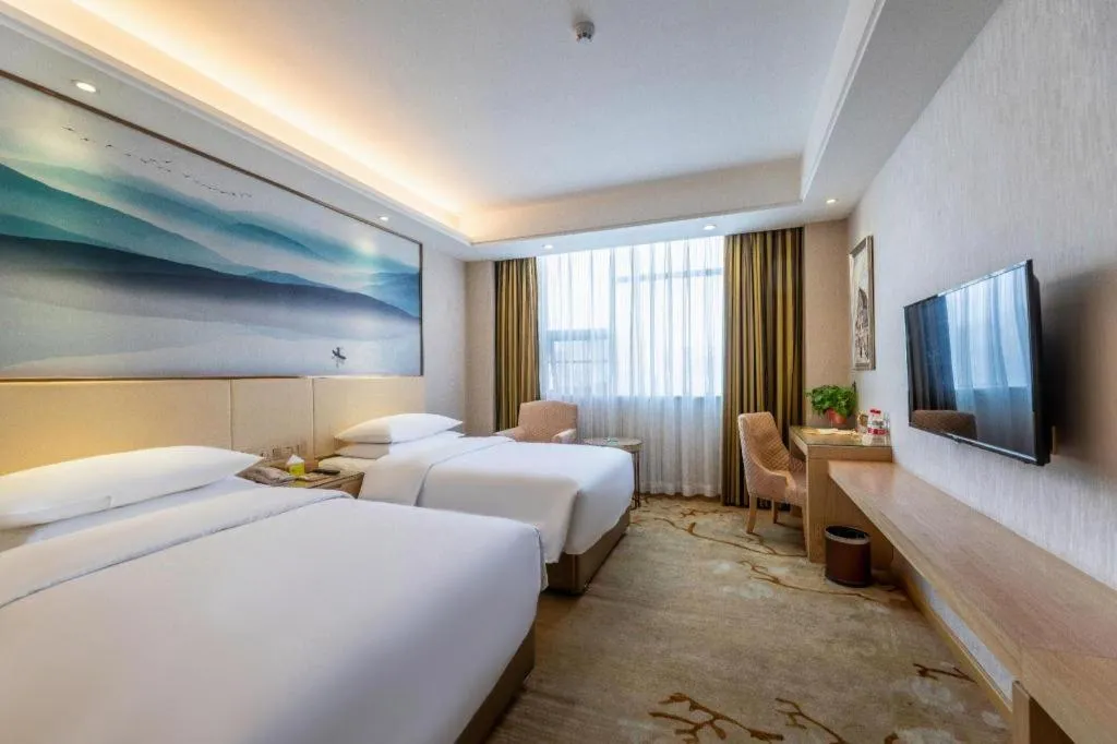 Bed in Vienna Hotel Hunan Huaihua Xupu Wanda Plaza