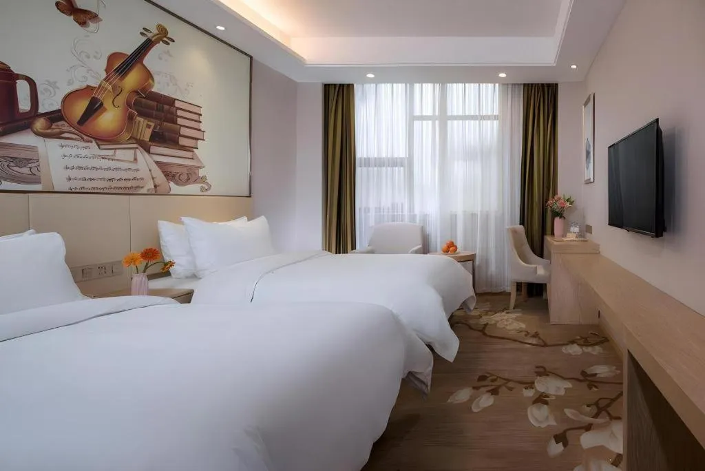 Bed in Vienna Hotel Hunan Huaihua Xupu Wanda Plaza